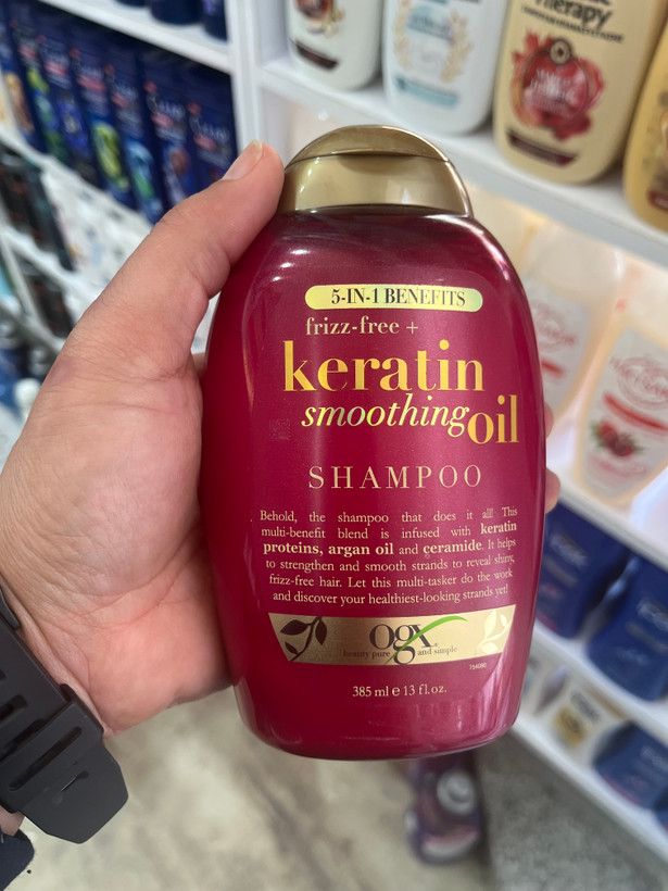شامپو روغن کراتین او جی ایکس (OGX) مدل Keratin Smoothing Oil حجم ۳۸۵ میل