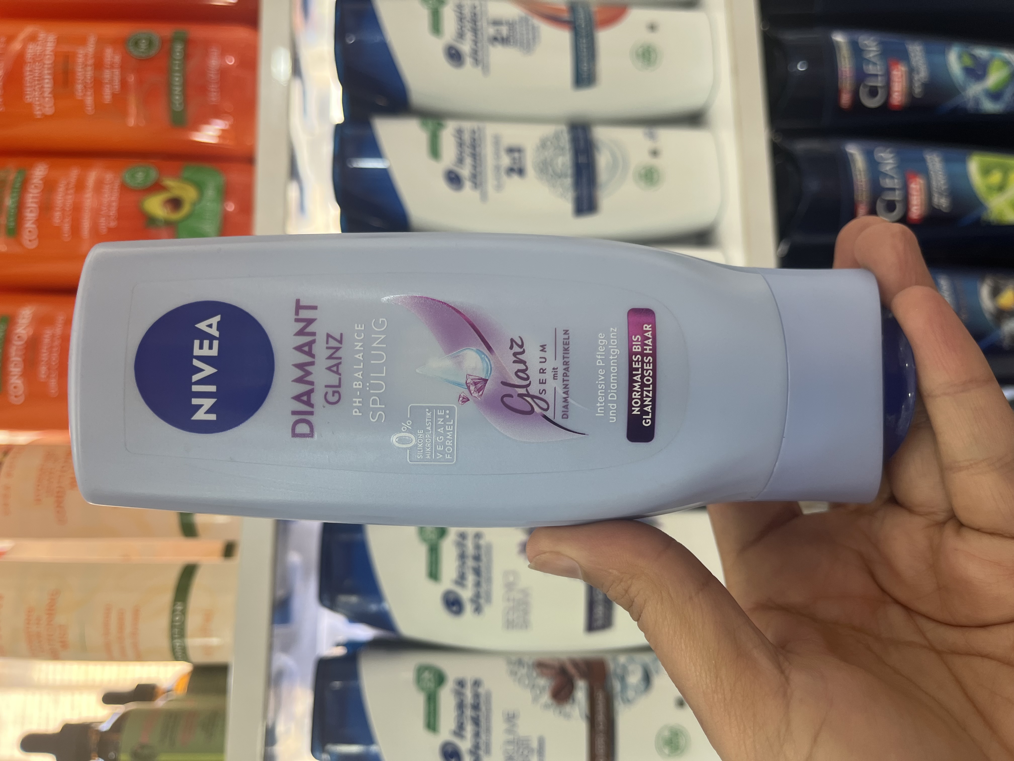 نرم‌کننده مو نیوآ Nivea مدل Diamant Glanz (درخشش الماس) – مخصوص موهای کدر