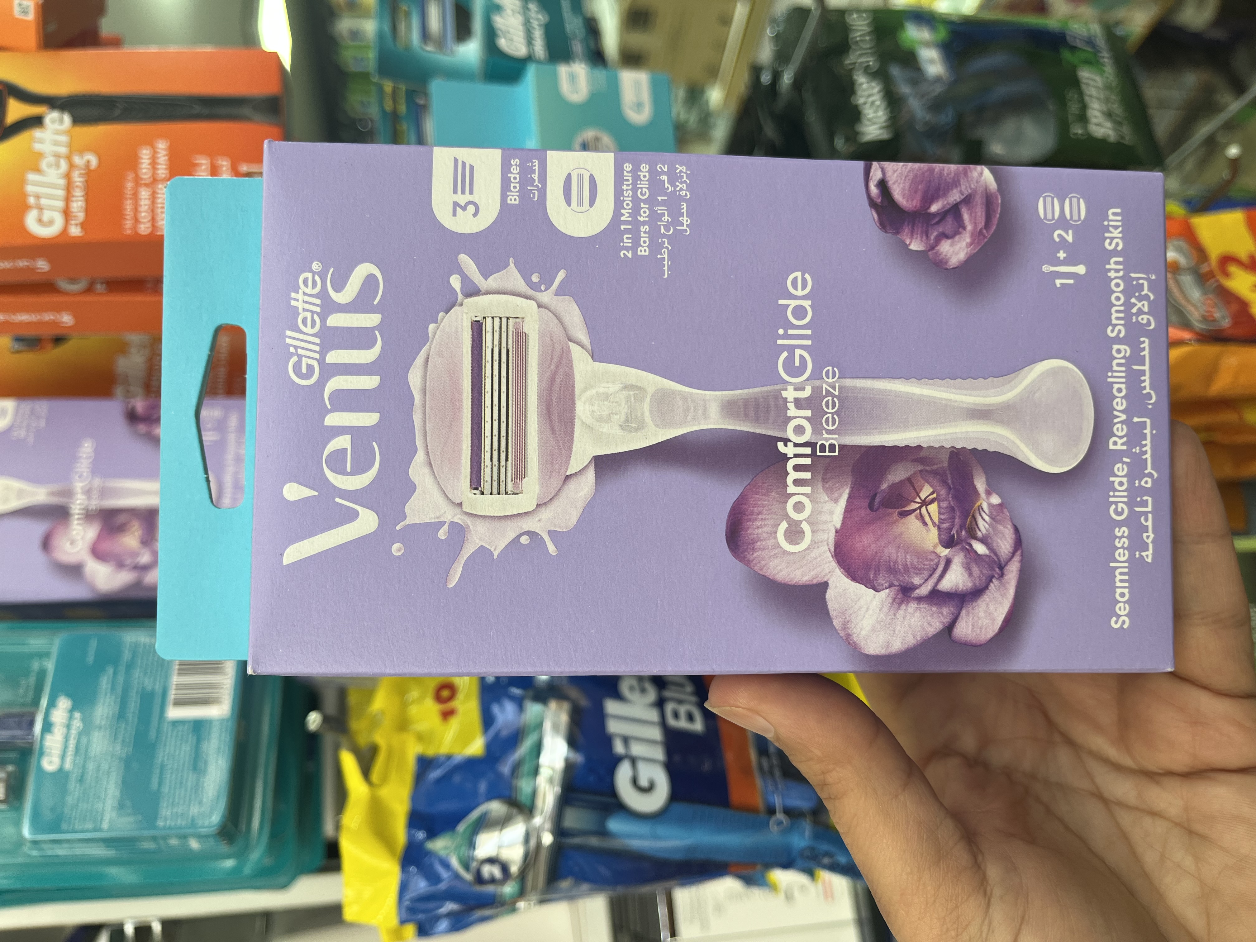 خودتراش زنانه ژیلت ونوس مدل ComfortGlide Breeze - رایحه گل فریزیا (ساخت لهستان)