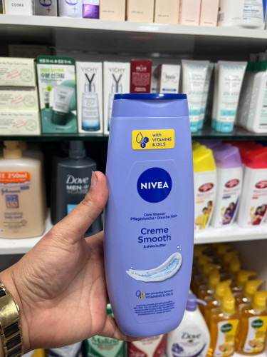 شامپو بدن نیوآ (NIVEA) مدل کرم اسموت (Creme Smooth) - حاوی شیباتر و ویتامین (حجم ۵۰۰ میلیلیتر)
