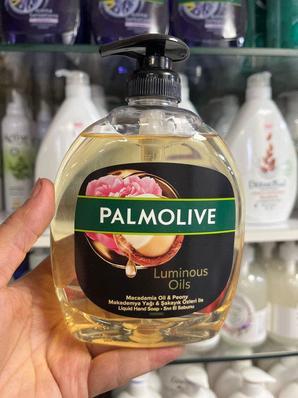 مایع دستشویی پالمولیو (Palmolive) مدل Luminous Oils حاوی روغن ماکادمیا و گل صدتومانی - ۵۰۰ میلیلیتر