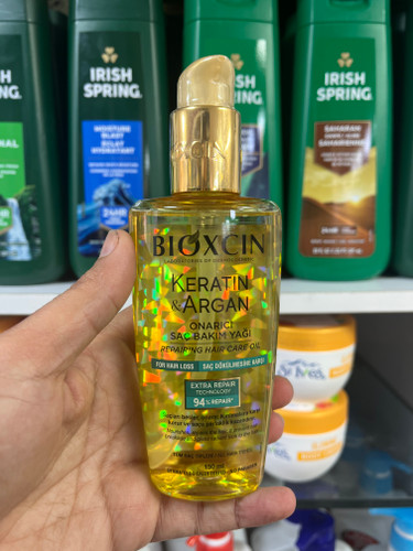 روغن موی ترمیمکننده و ضد ریزش بیوکسین (Bioxcin) مدل Keratin & Argan - ۱۵۰ میلیلیتر