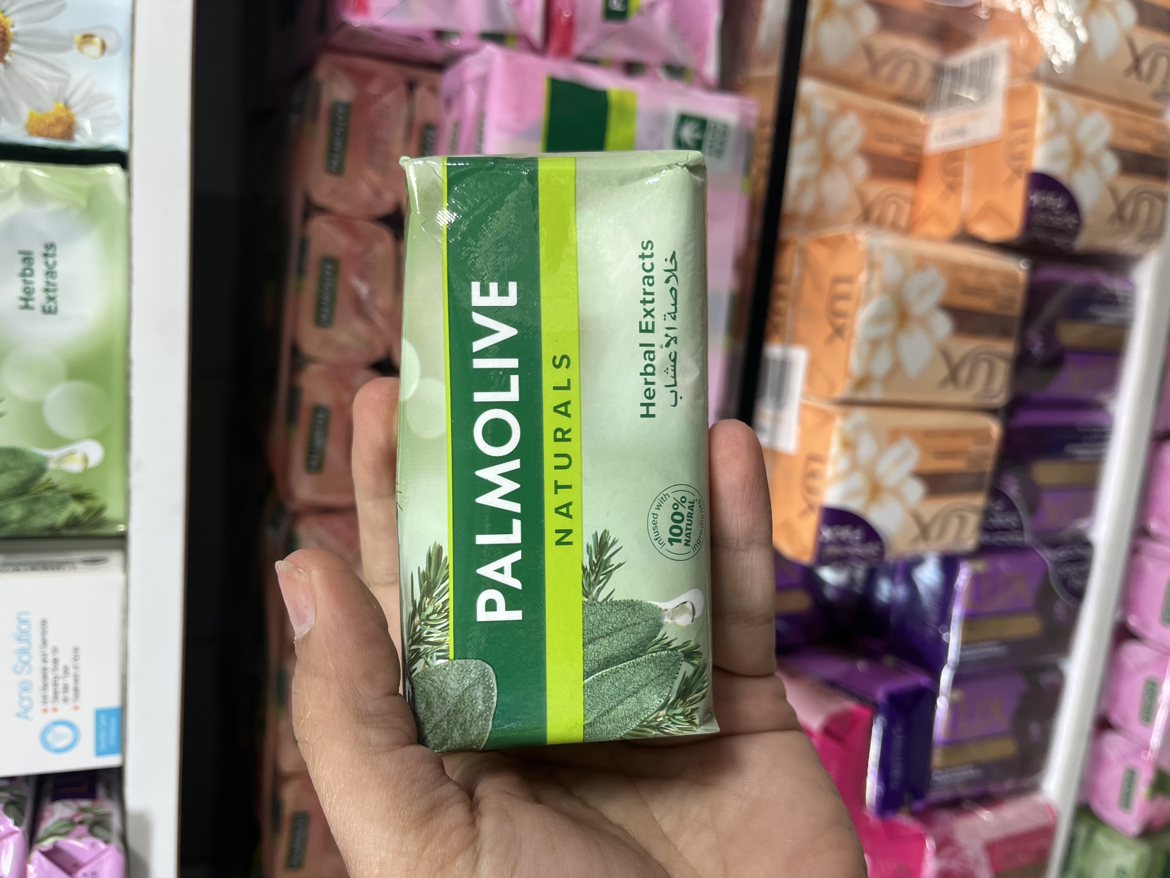 صـابـون طـبـیـعی پـالـمـولـیـو (Palmolive) مـدل Herbal Extracts حاوی عصاره ۵ گیاه و روغن درخت چای - ۱۷۰ گـرم