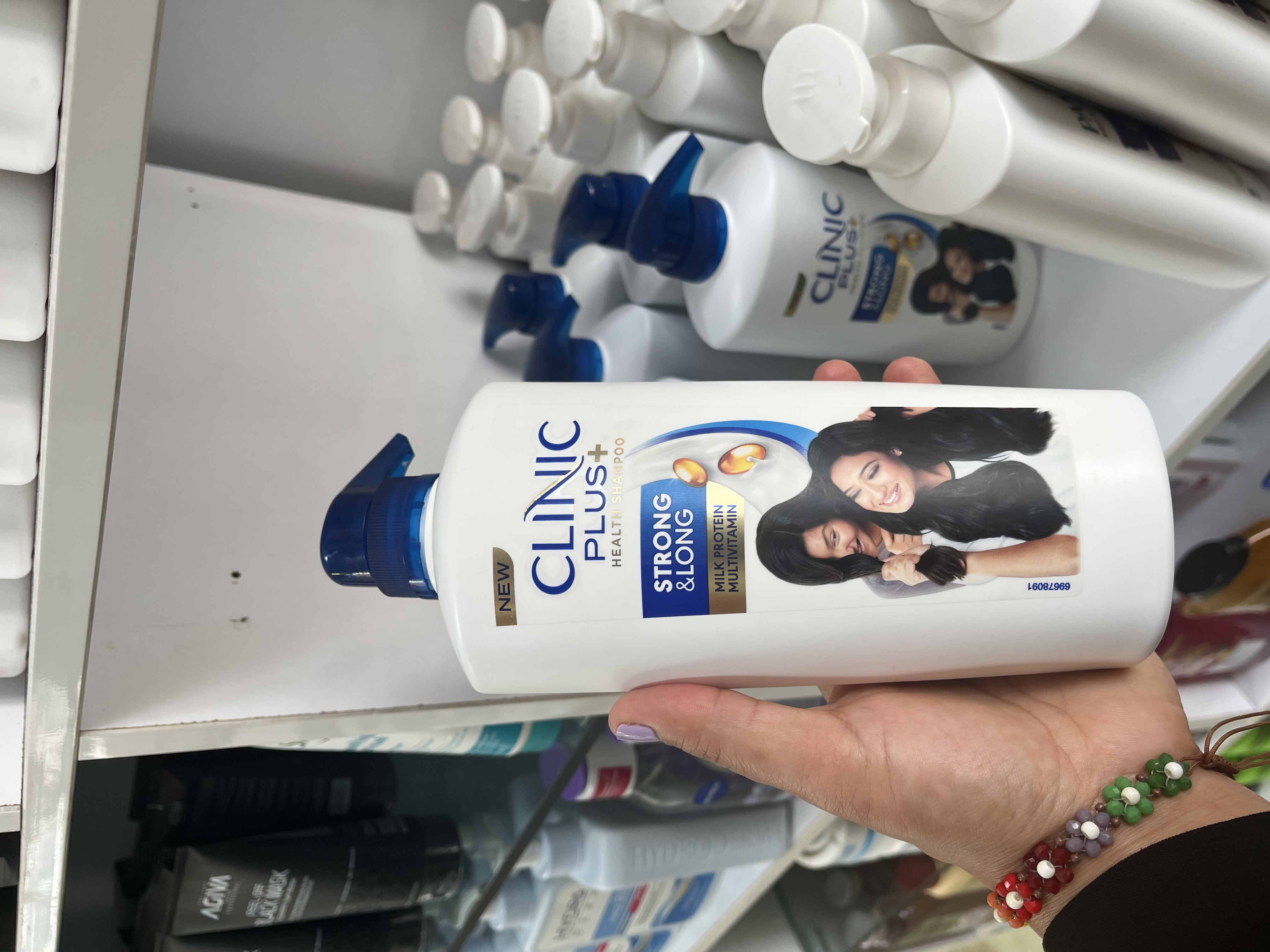 شامپو تقویت‌کننده و ضدریزش کلینیک پلاس (Clinic Plus) مدل Strong & Long - حاوی پروتئین شیر و مولتی‌ویتامین (۶۵۰ میل)