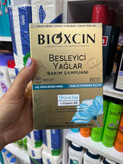 شامپو مراقبتی و ضد ریزش بایوکسین (Bioxcin) حاوی ۹ روغن مغذی - ۳۰۰ میلیلیتر (مخصوص موهای خشک و آسیبدیده)