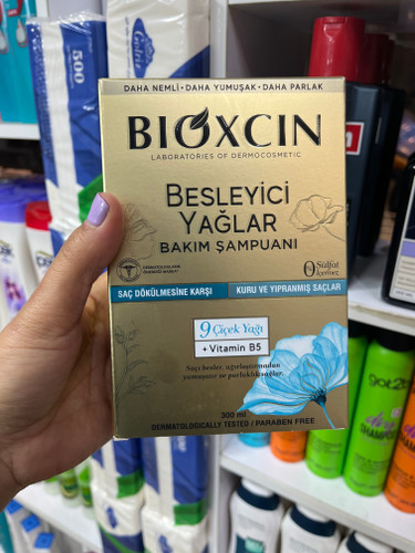شامپو مراقبتی و ضد ریزش بایوکسین (Bioxcin) حاوی ۹ روغن مغذی - ۳۰۰ میلیلیتر (مخصوص موهای خشک و آسیبدیده)